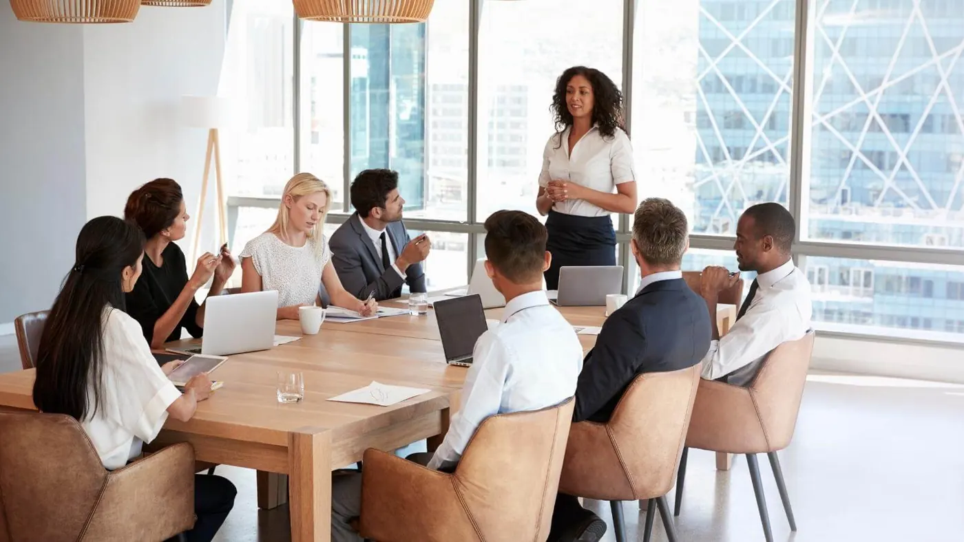 Woman talking to her team during a meeting