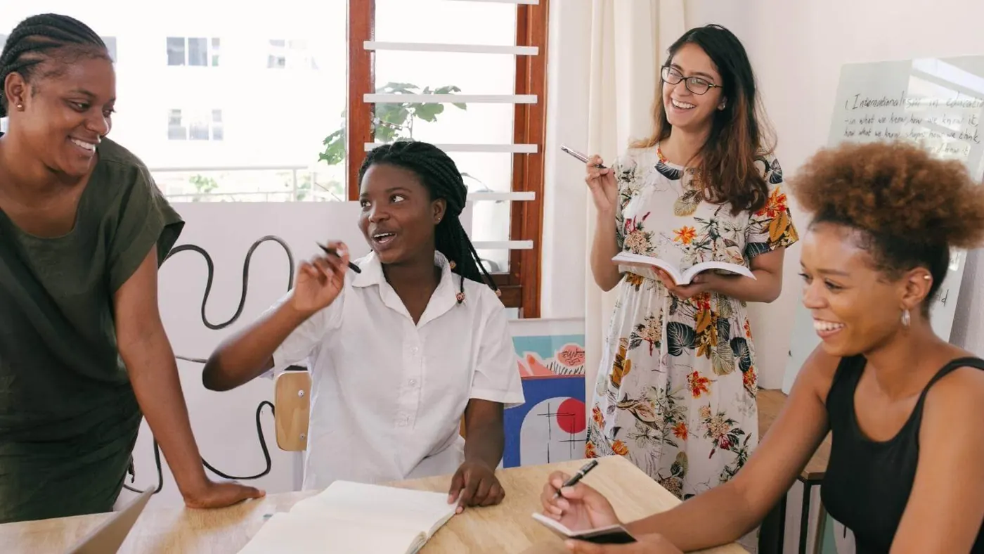 women-laughing-during-meeting